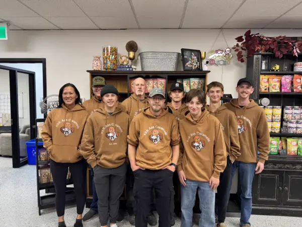 The Kick Ass Caramels crew inside the shop