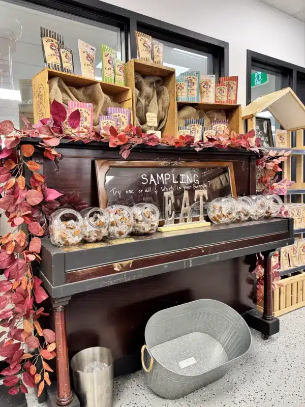 Caramel sampling station built from an old piano