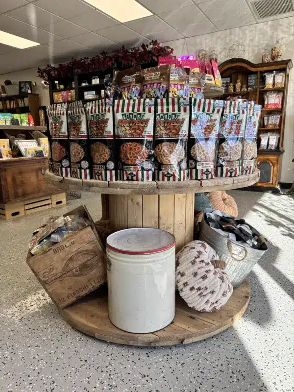Caramels displayed on a wooden spool table in the shop
